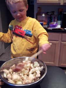 Roasted Balsamic Cauliflower - toddler mixing