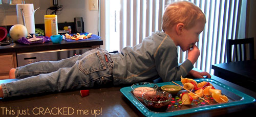 Ryan laying with the Fun Fruit Kabobs
