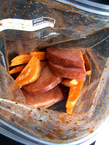 Grilled Ham Steaks with Sweet Potatoes marinating