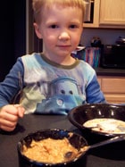 toddler eating Homemade Apple Pie Oatmeal 1
