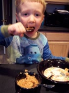 toddler eating Homemade Apple Pie Oatmeal 2