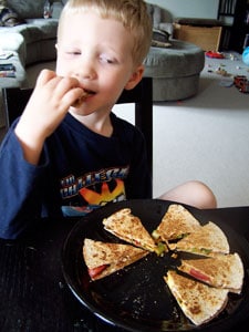 Quick Avocado Quesadilla  - toddler eating