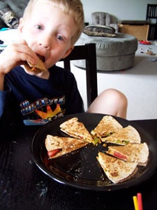 Quick Avocado Quesadilla  - toddler eating 2