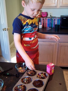 Whole Wheat Chocolate Muffins with Added Protein (and Sprinkles!) - adding the sprinkles