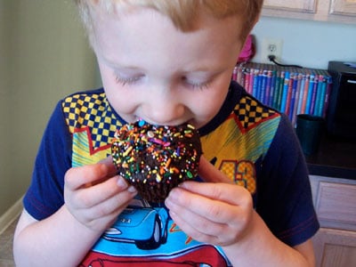 Whole Wheat Chocolate Muffins with Added Protein (and Sprinkles!) - eating