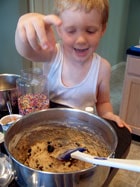 the toddler baking muffins 2