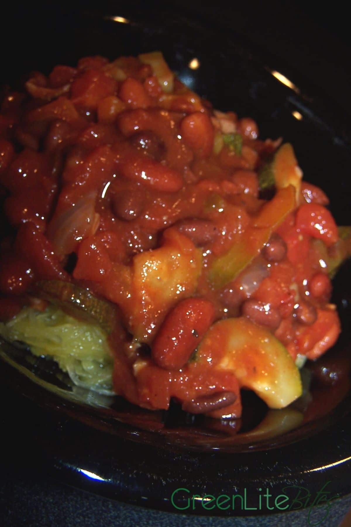 Vegetarian chili in black bowl