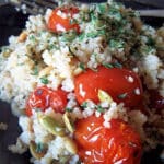 roasted tomatoes couscous & pumpkin seed kernels featured