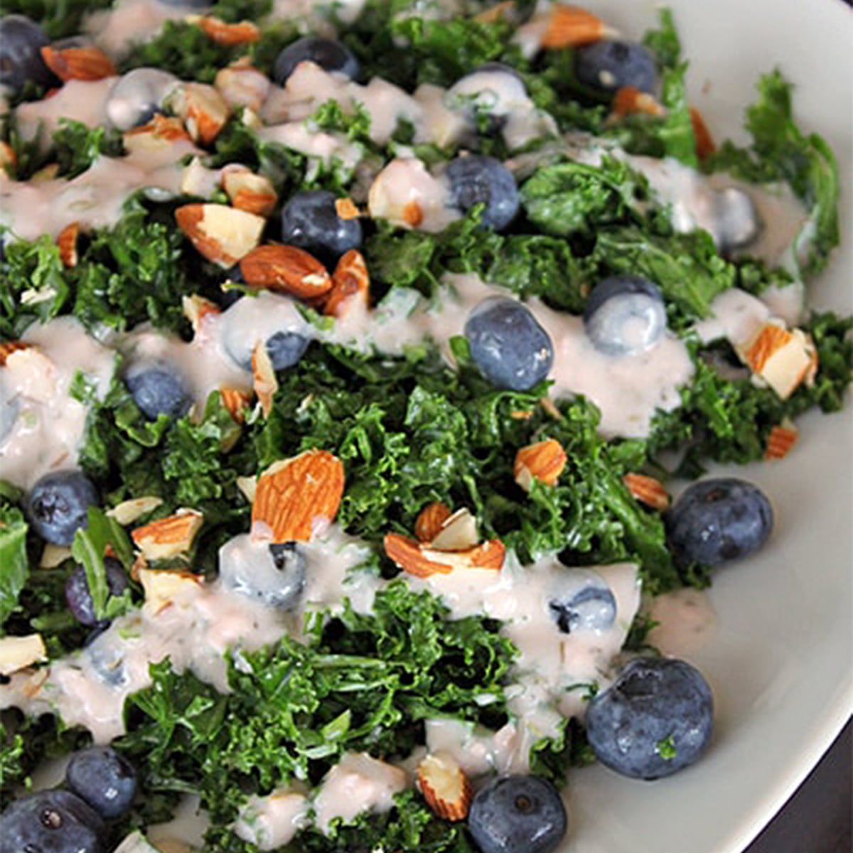 kale blueberry salad featured