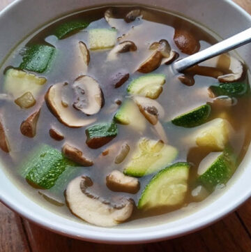 bowl of Mushroom and Zucchini Soup with Northern Beans