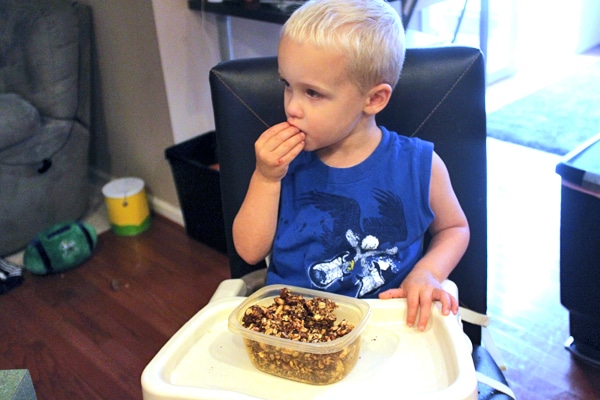 Toddler eating Homemade Granola