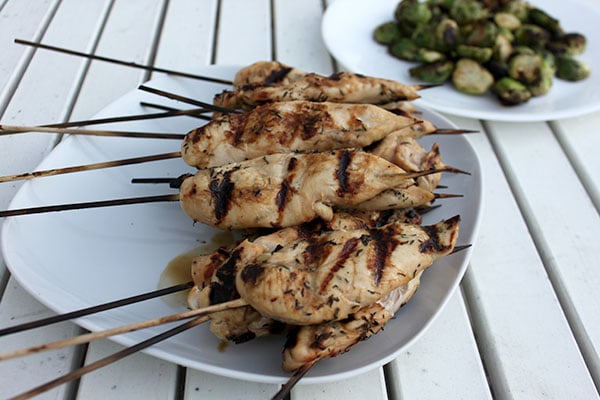 Citrus Thyme Chicken on a Stick with Grilled Brussels  Resting