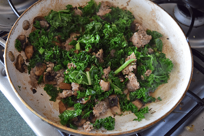 kale added to the mushrooms and sausage. 