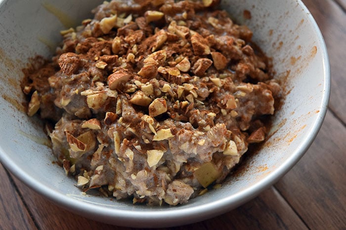 Apple Pie Oatmeal topped with almonds and honey