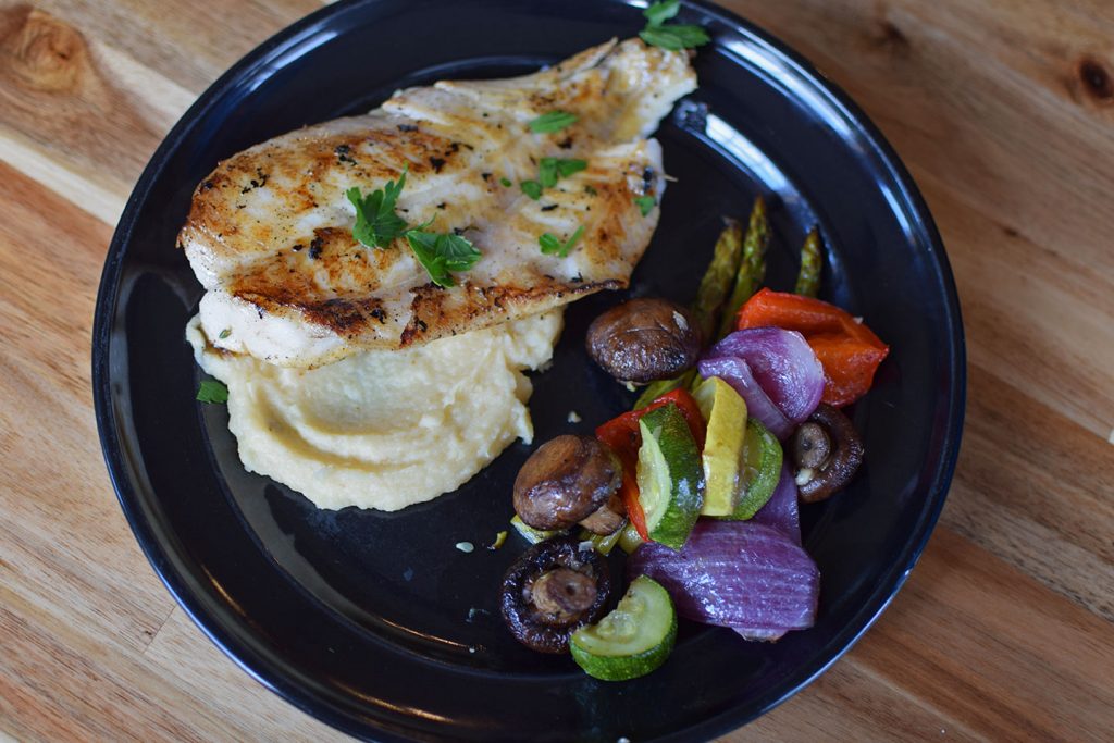 Orange Roughy over Parsnip Puree and a side of Summer Veggies